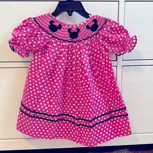 Tiaras and Frogs smocked Minnie Mouse Dress. Pink Disney dress. Size 6 months.